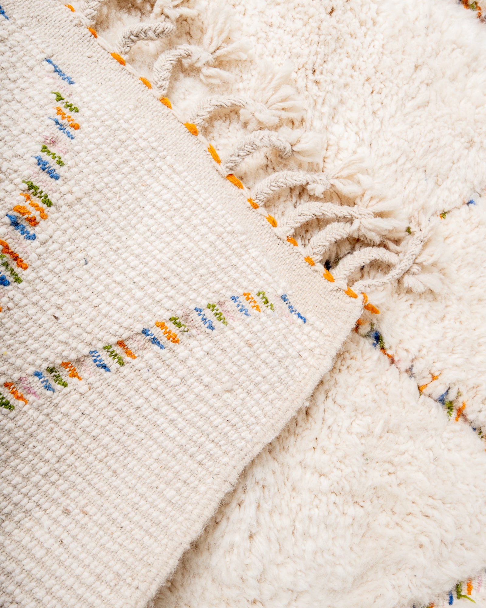 Modern, designer, handcrafted Berber rug from Morocco. Beniourain carpet with beautiful colours and patterns and fluffy wool texture.